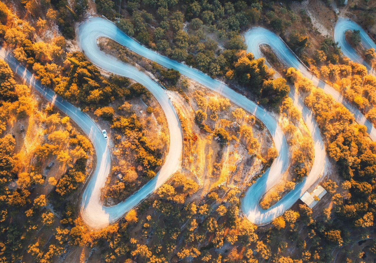 Image of a winding road through a scenic landscape, symbolizing the diverse journeys of non-traditional students pursuing PA education.